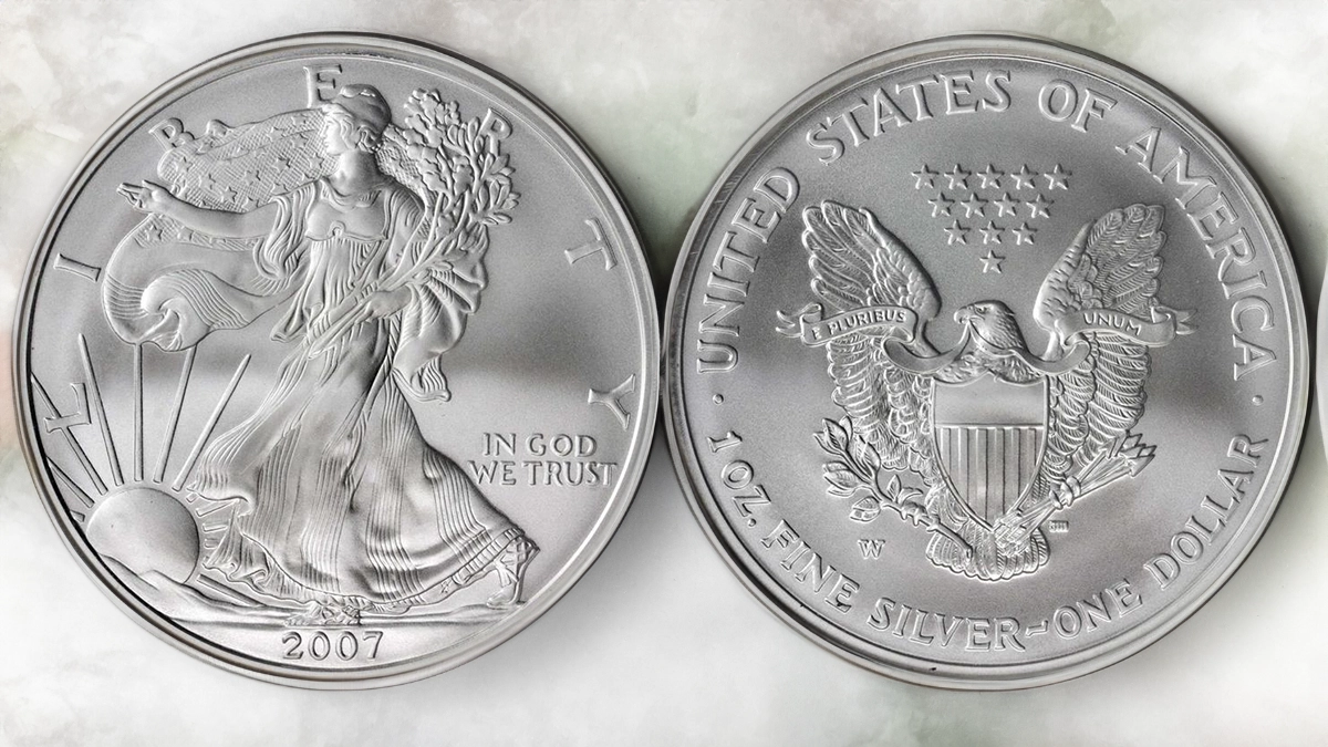 Grading strip showing four 2007 American Silver Eagles in MS67, MS68, MS69, and MS70 condition from left to right